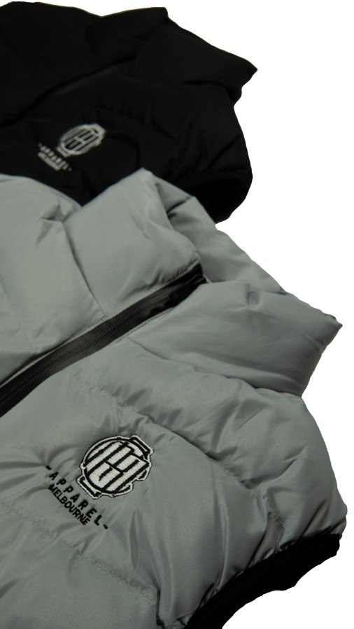 grey and black puffer vest front embroidery